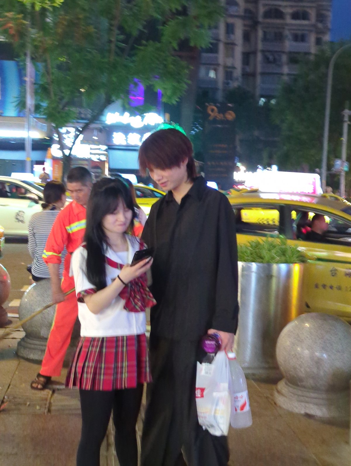 Night market energy across Longta and Liangjiang streets