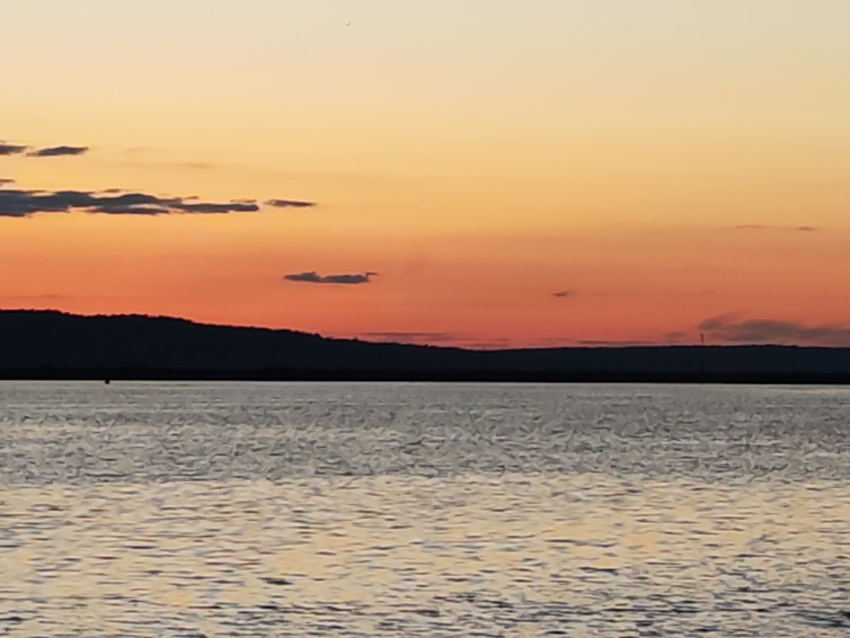 Twilight sunset documented over Votkinsk Reservoir near Chaikovsky, Russia