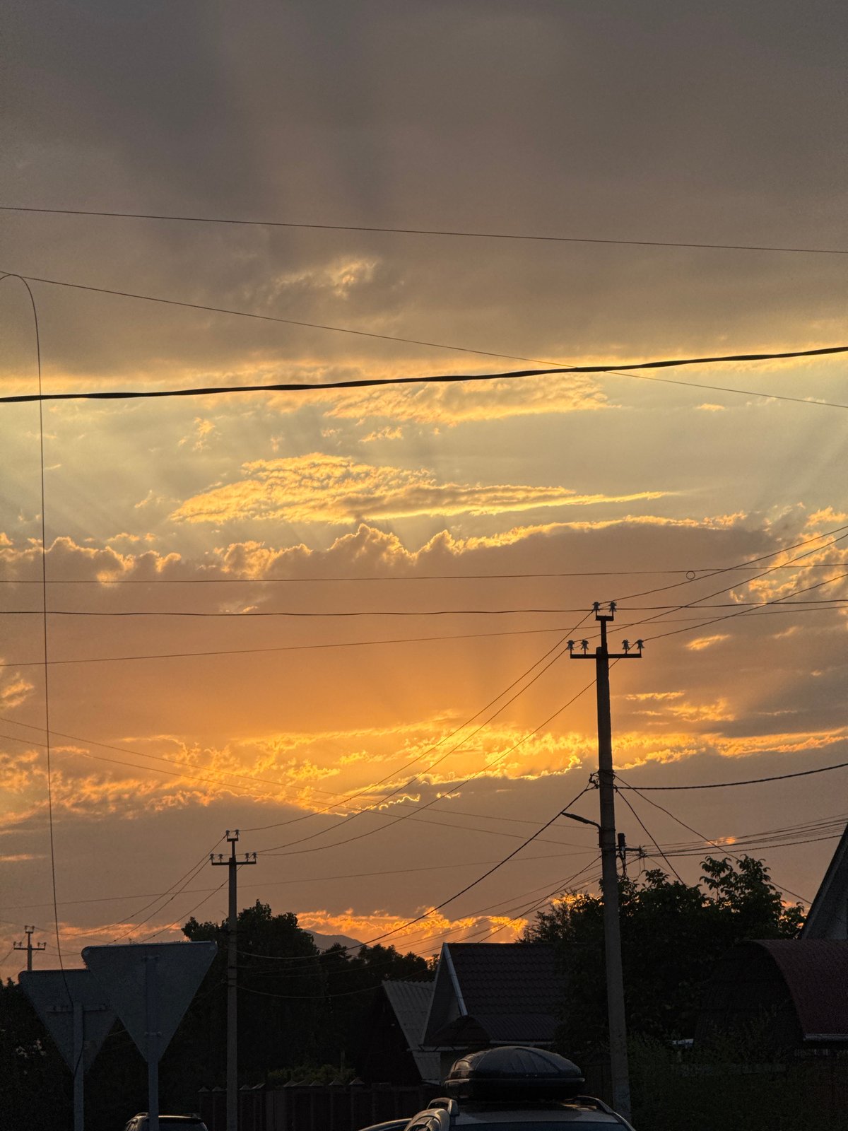 Golden sunset sweeps across Talas City streets and skyline