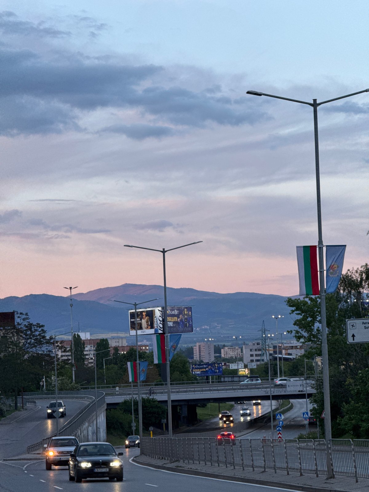 Evening traffic captured near McDonald's during Sofia sunset