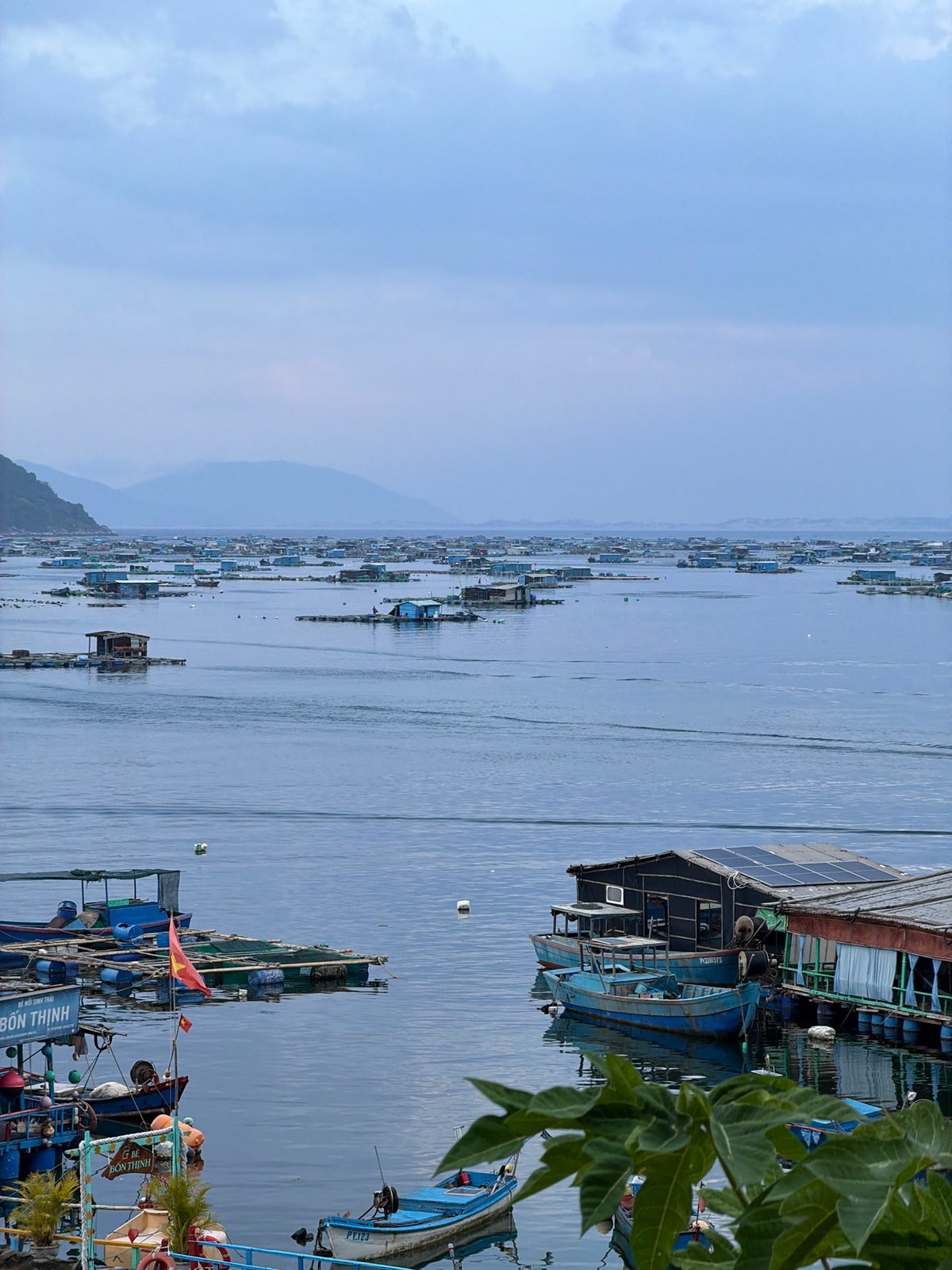 Floating village life on the bay in Hoa Xuan, Vietnam