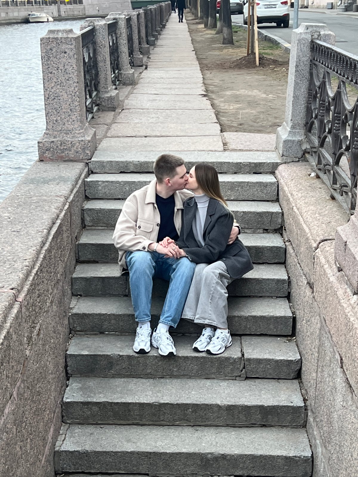 Couple shares romantic moment on Saint Petersburg staircase
