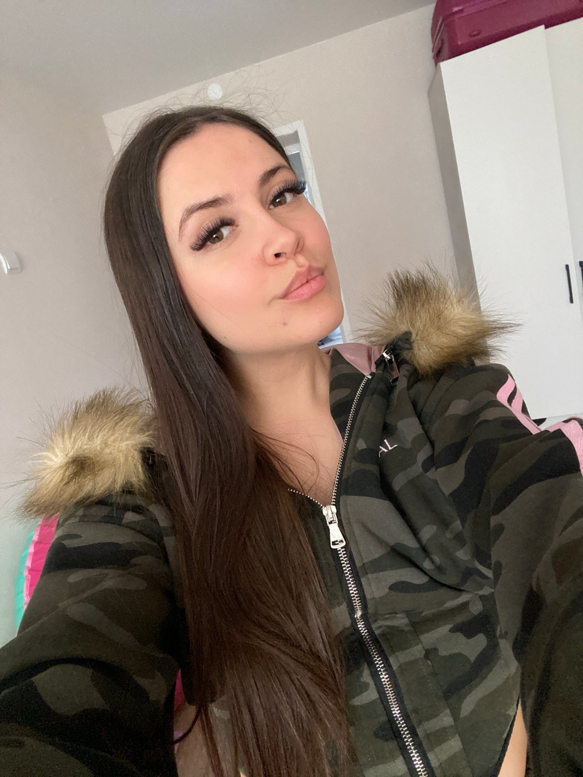 Woman records selfies and cat videos in Chaikovsky apartment