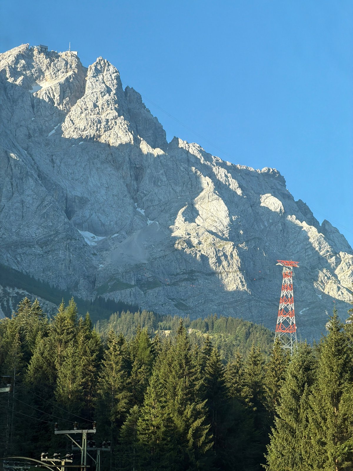 Zugspitze from Grainau, rocky summit and forest foreground