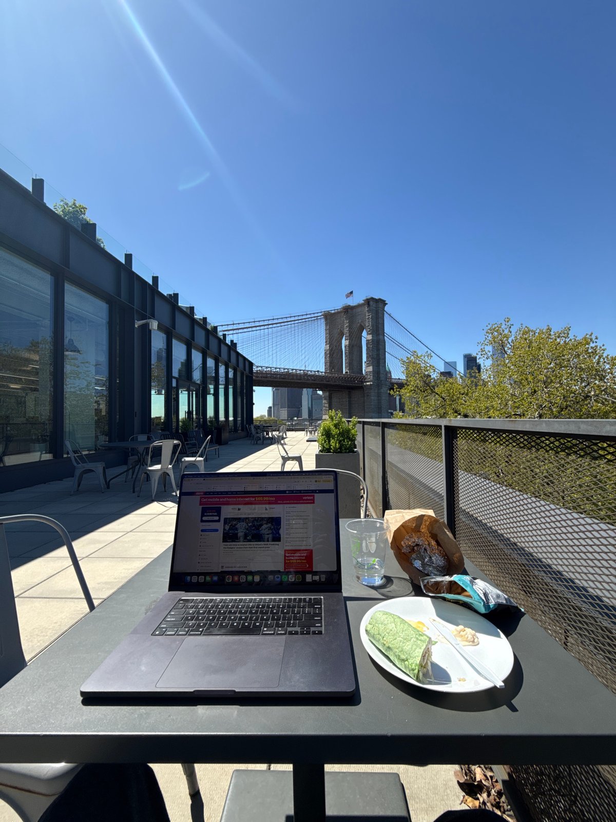 Brooklyn Bridge viewed from Manhattan rooftop terrace