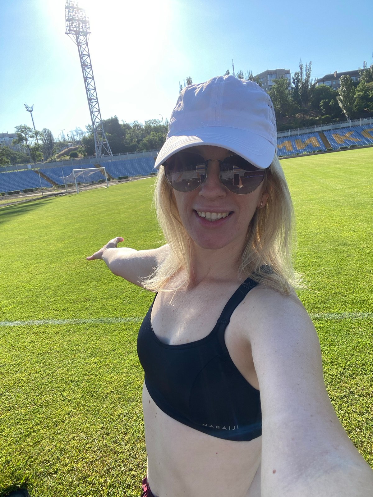 Jump rope workout and selfies at a sunny stadium track