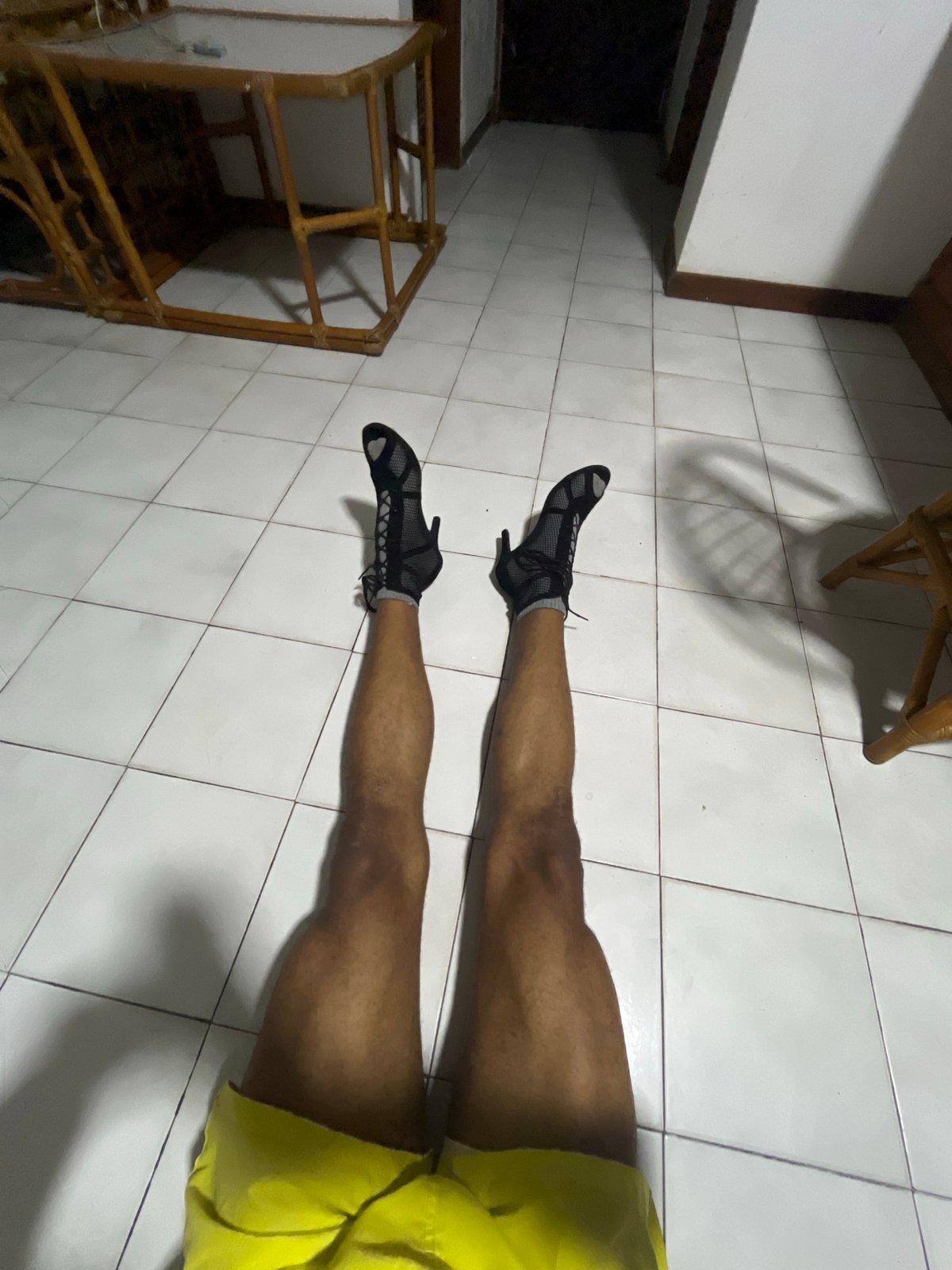 Man performs gymnastics routine in heels in Porlamar home