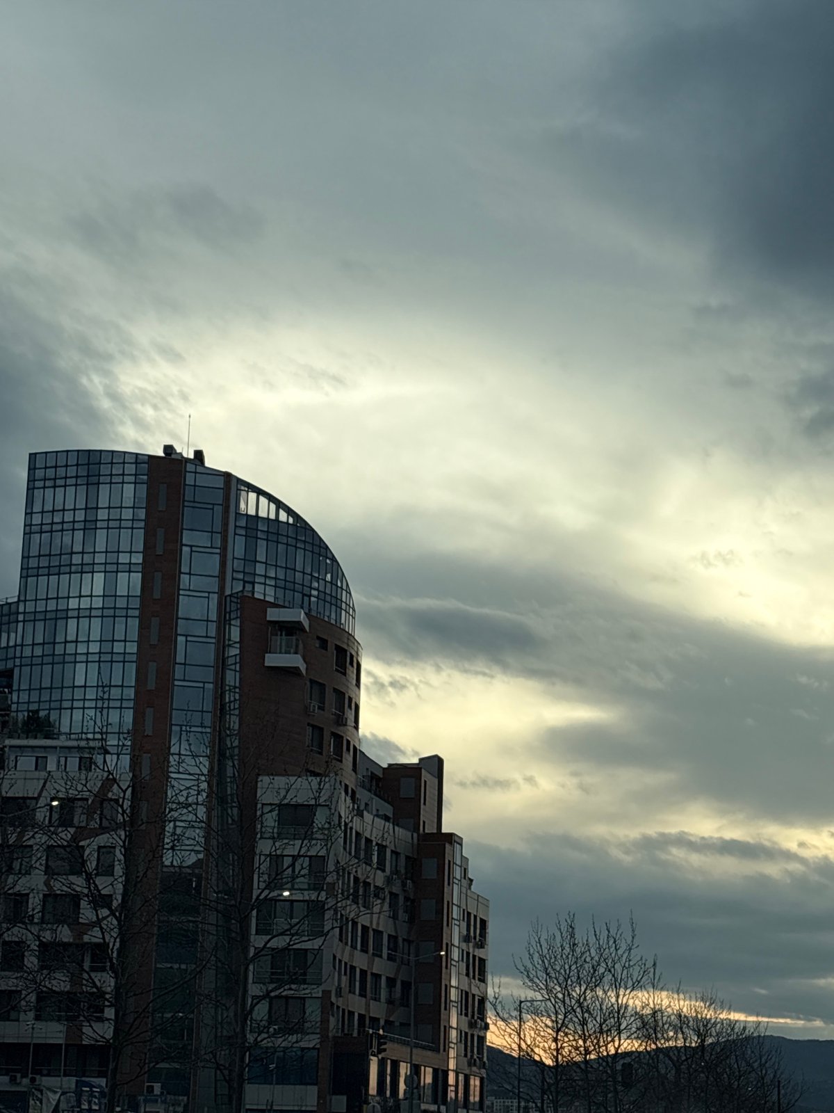 Modern curved glass building documented in Sofia, Bulgaria