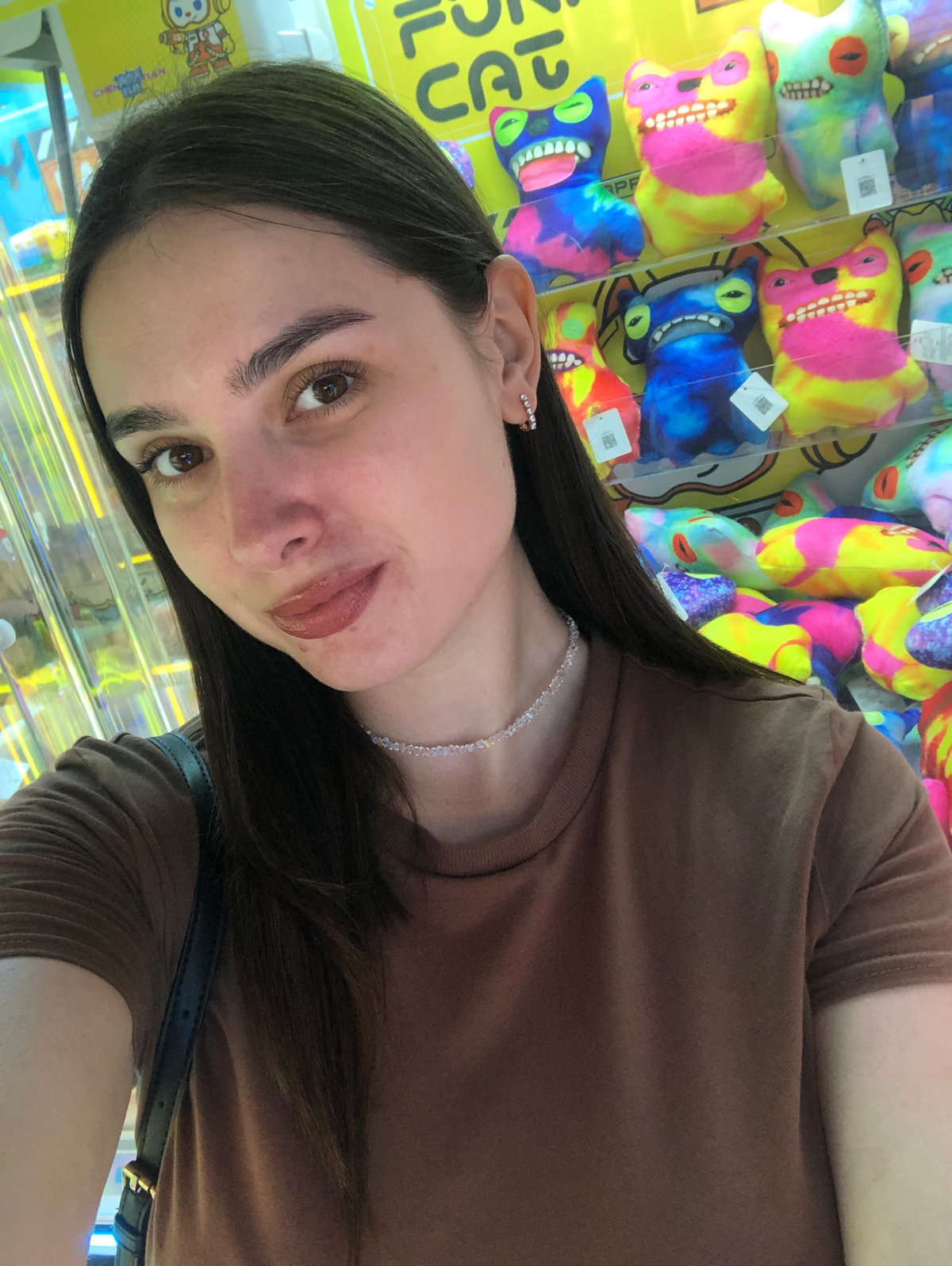 Fairground afternoon in Chaikovsky — rides, claw machines, waterfront