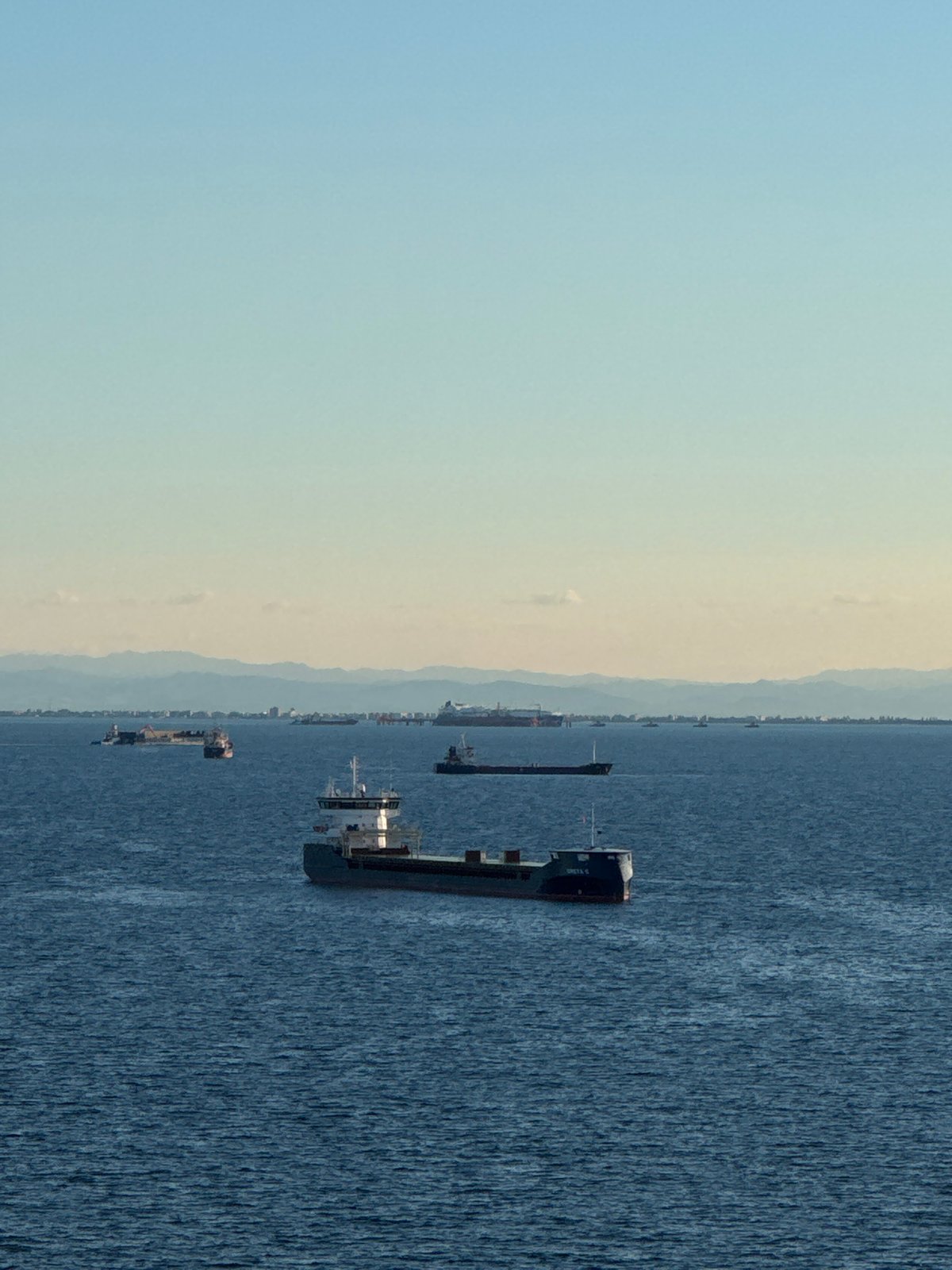 Maritime activity documented off Italian coast including oil rig