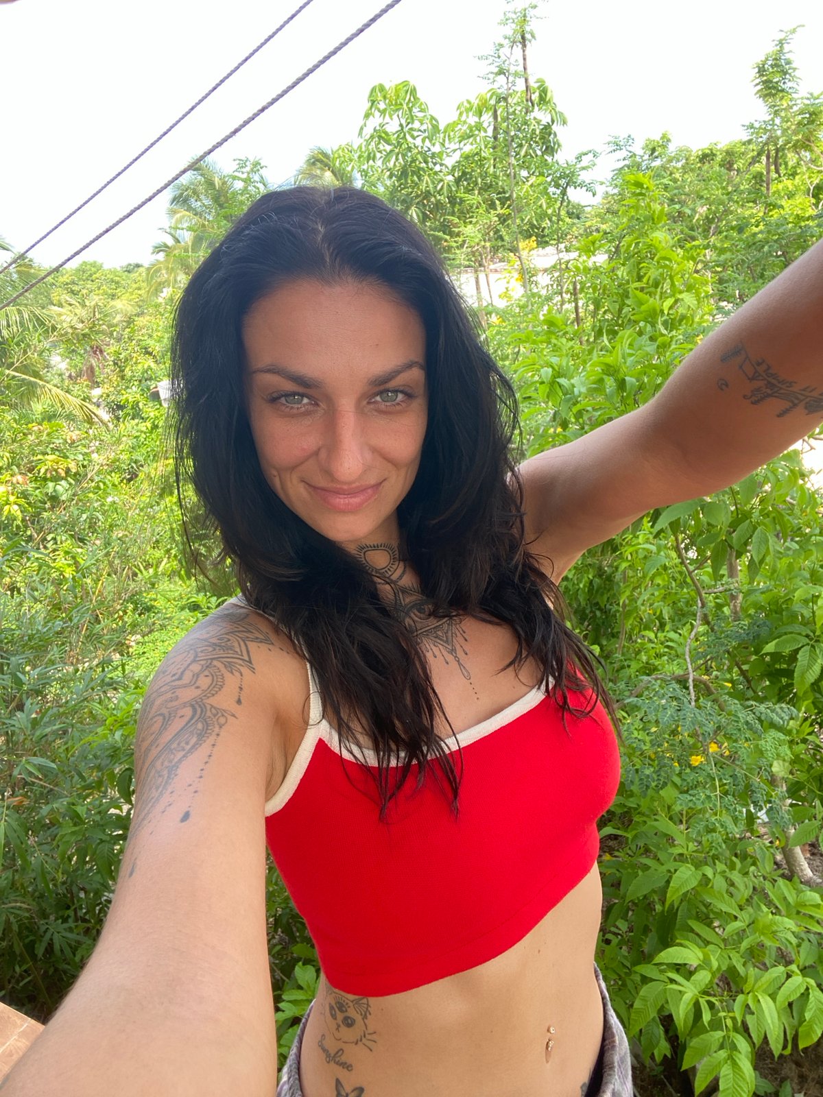 Woman documents morning selfie session in Mũi Né, Vietnam