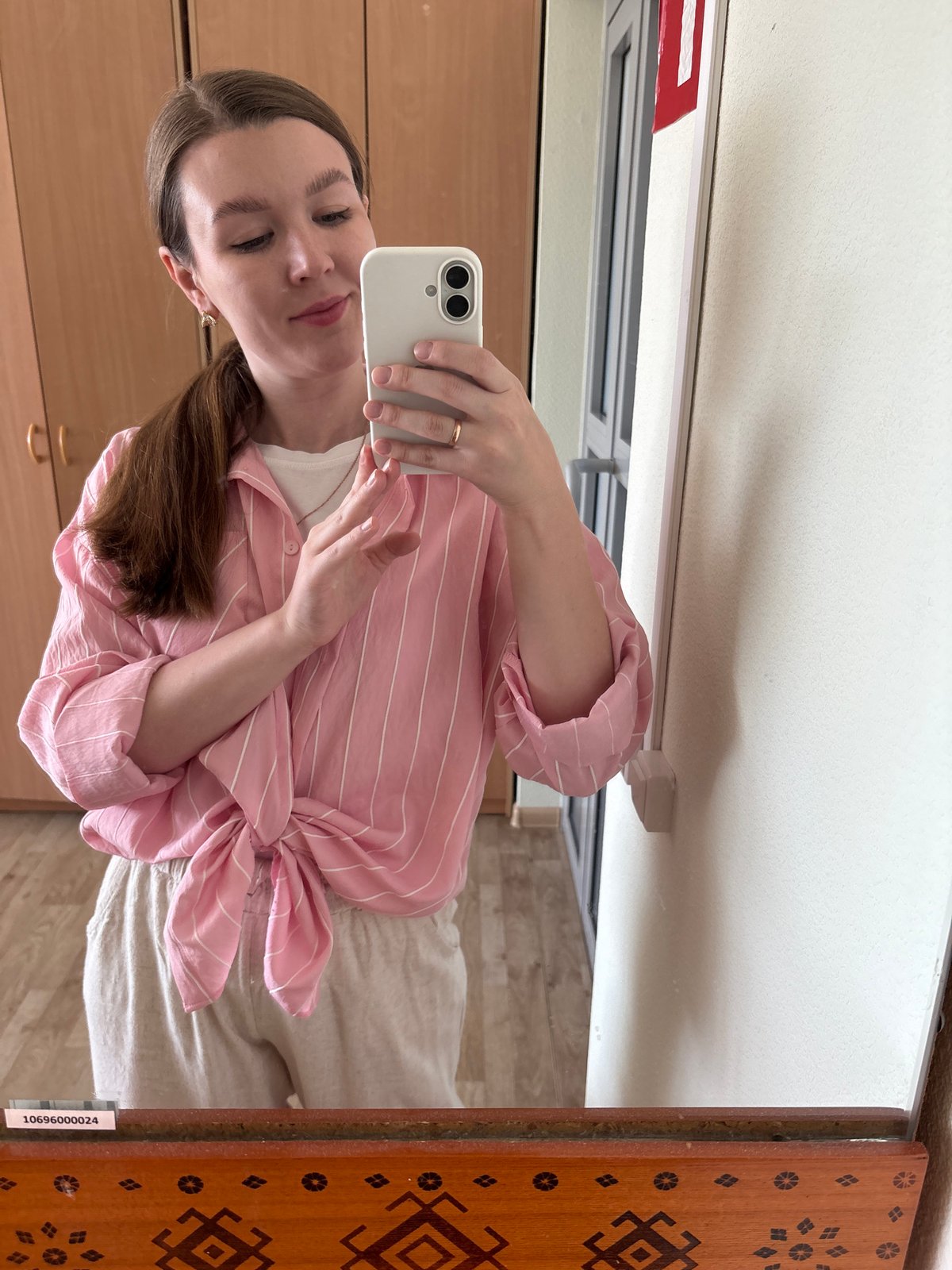Woman documents selfie session in mirrors across Izhevsk