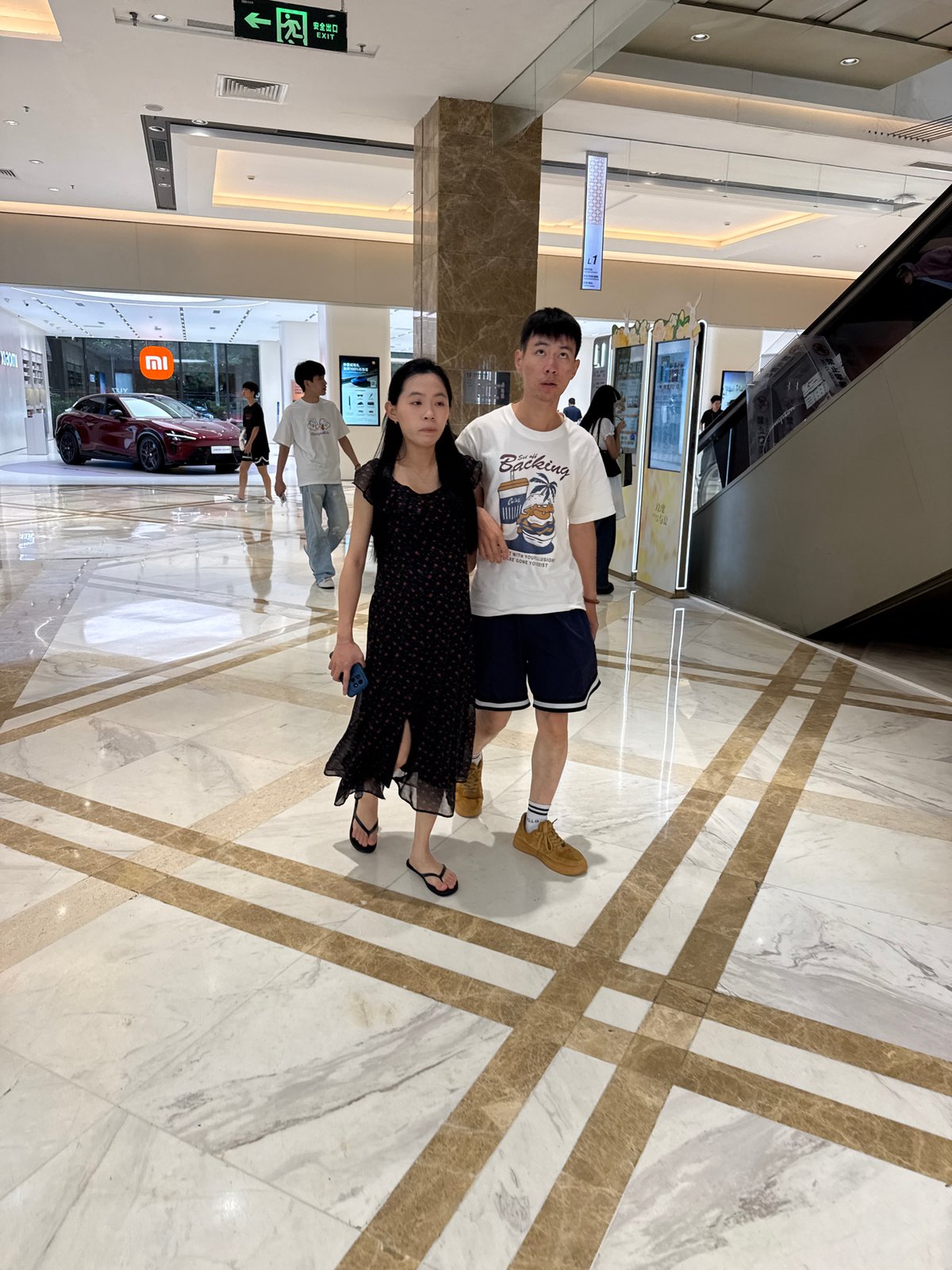 Browsing a Huizhou mall: EVs, tech stores, and retail