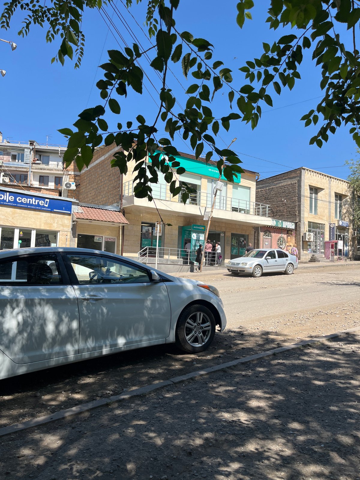 Quiet roads and parked vehicles in rural Armenia