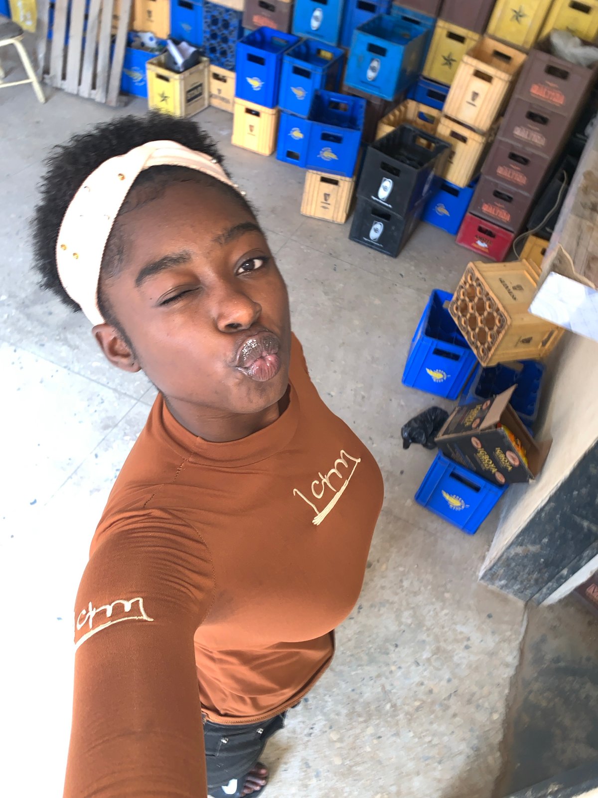 Woman documents afternoon with selfies and Nigerian meal