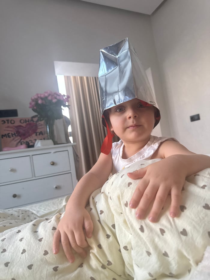 Young child captured in casual indoor moments in Khimki