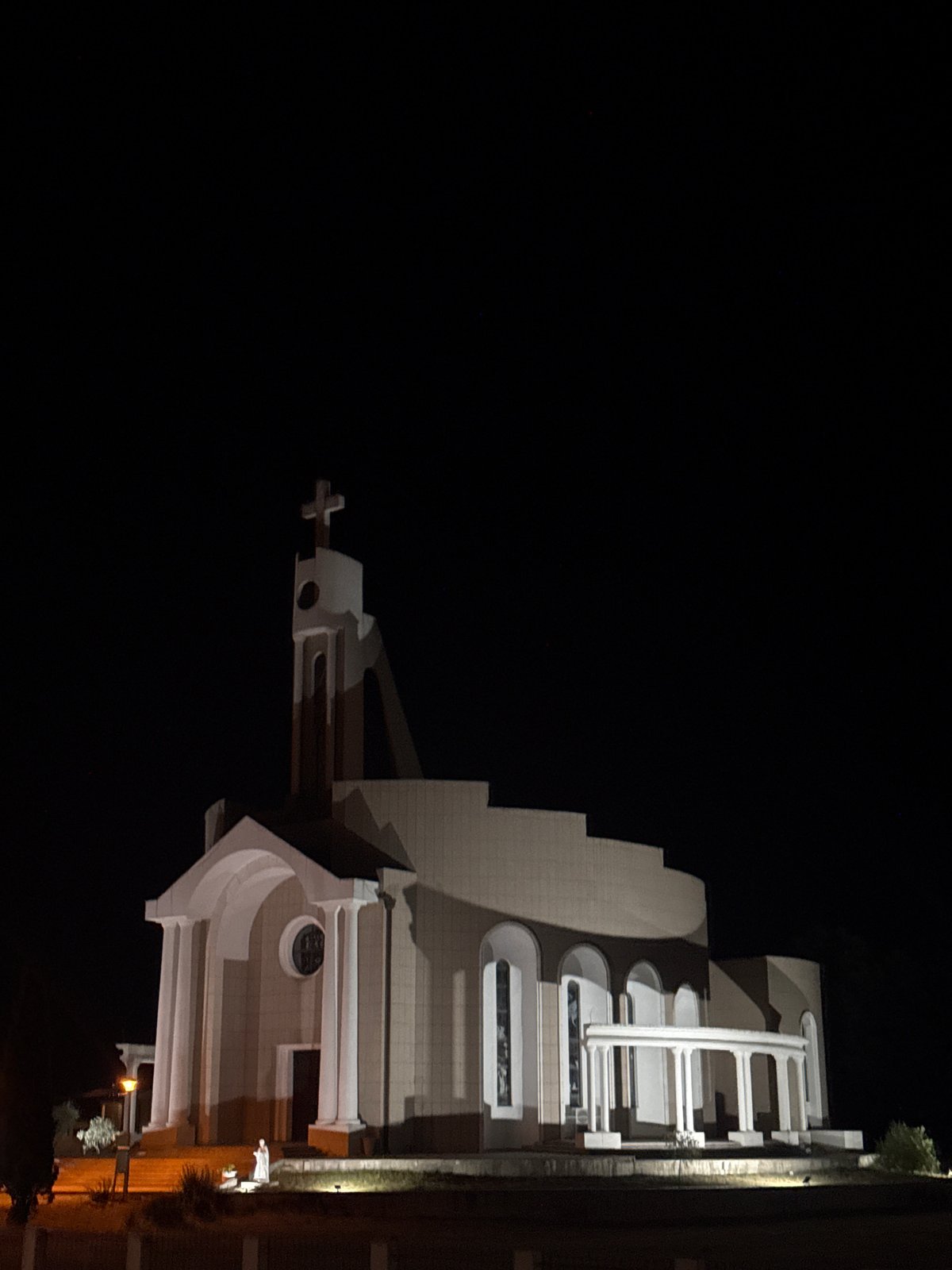 Nighttime church and hotel scene in Donji Štoj, Montenegro