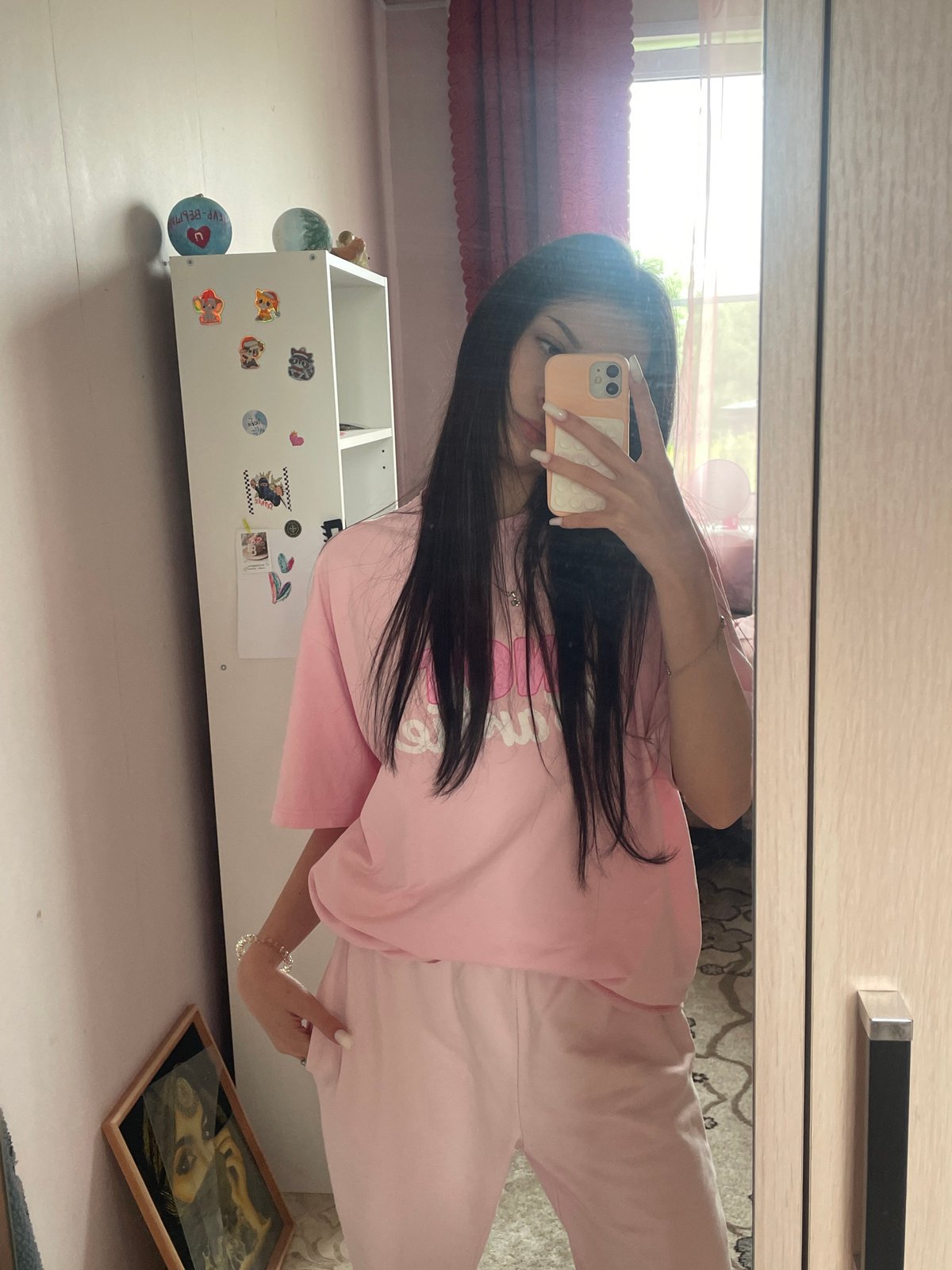 Woman documents morning routine through selfies in Медведево, Russia