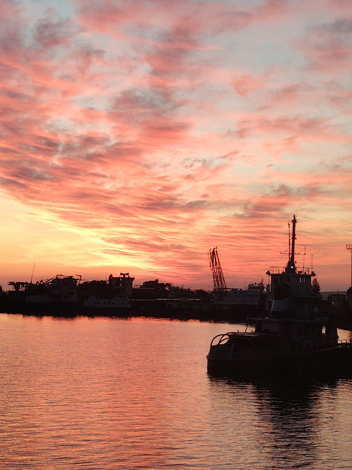 Vibrant sunset documented at Chaikovsky port with family moments