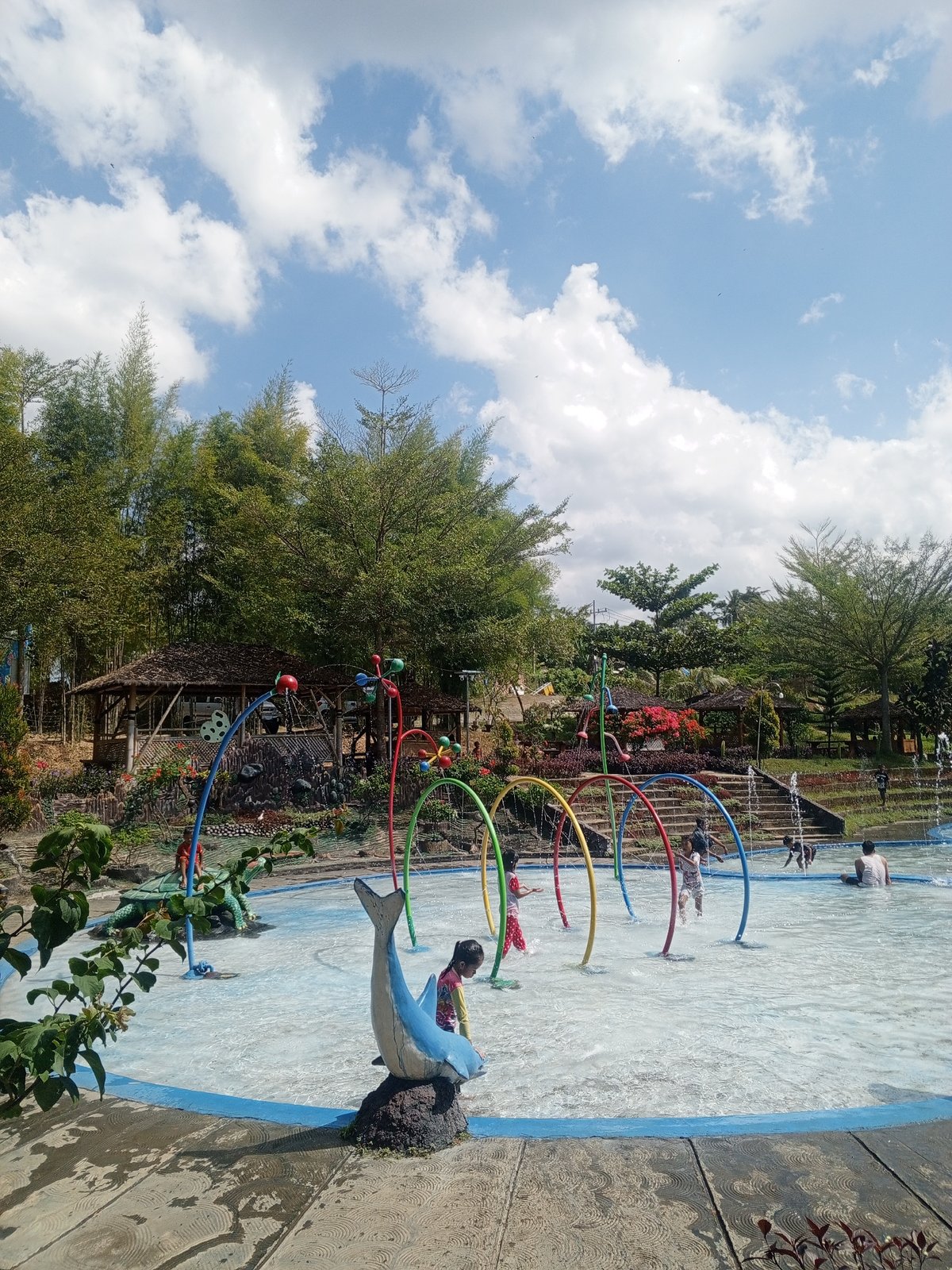 Busy water park in Darsono on a sunny morning