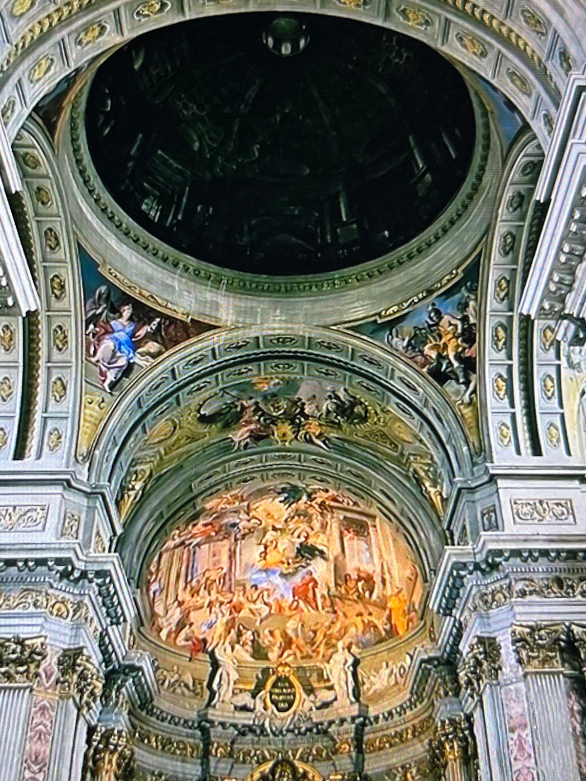 Ornate church ceiling with contrasting domes documented in Tinaquillo