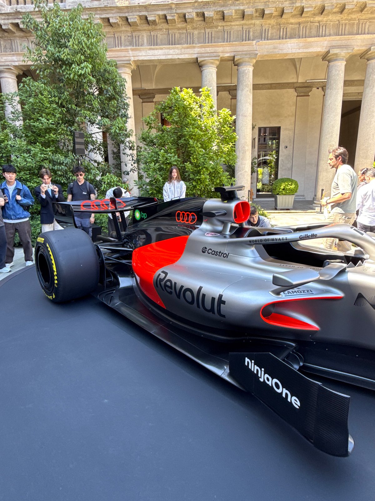 Formula One car exhibition draws crowds in Milan courtyard