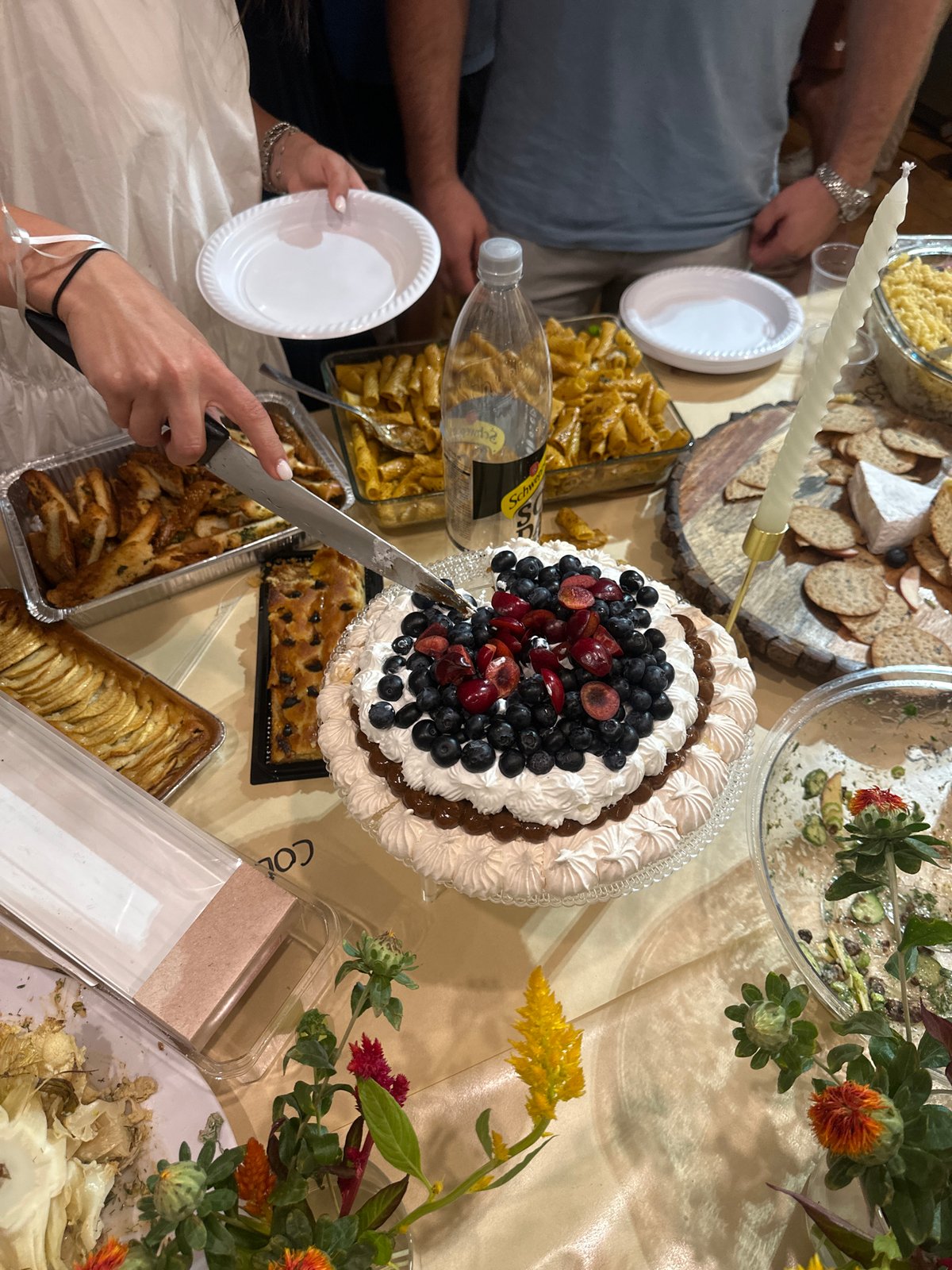 Evening celebration with food and cake in Tel Aviv