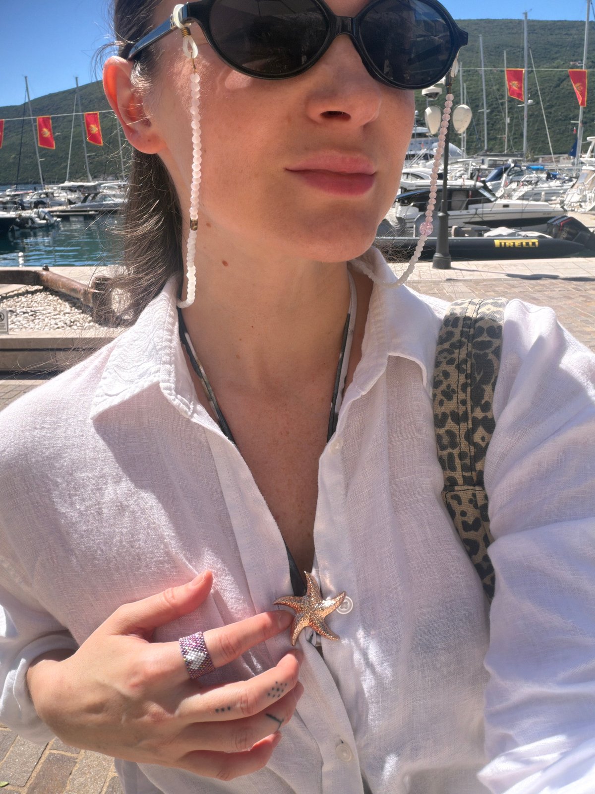 Woman in starfish-adorned shirt spotted at Montenegro marina