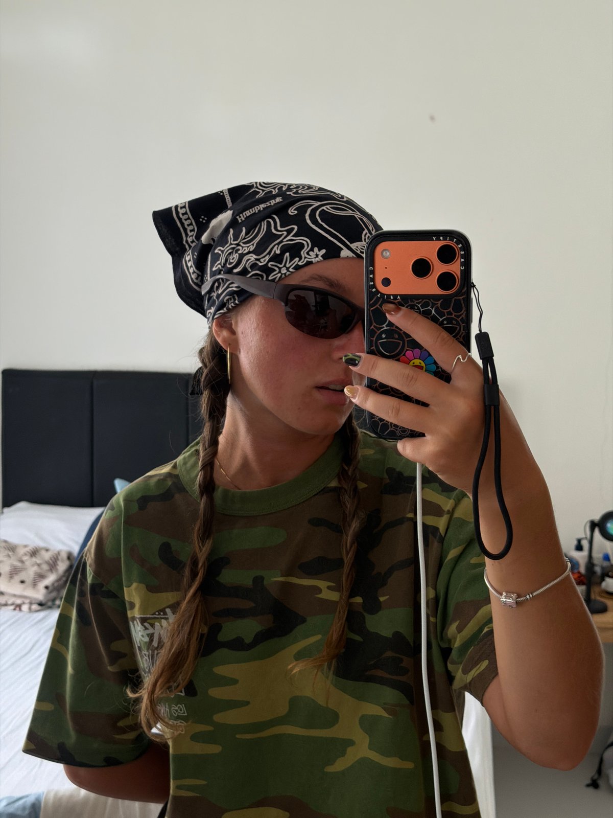 Person documents personal belongings and takes selfies in Kuta Selatan