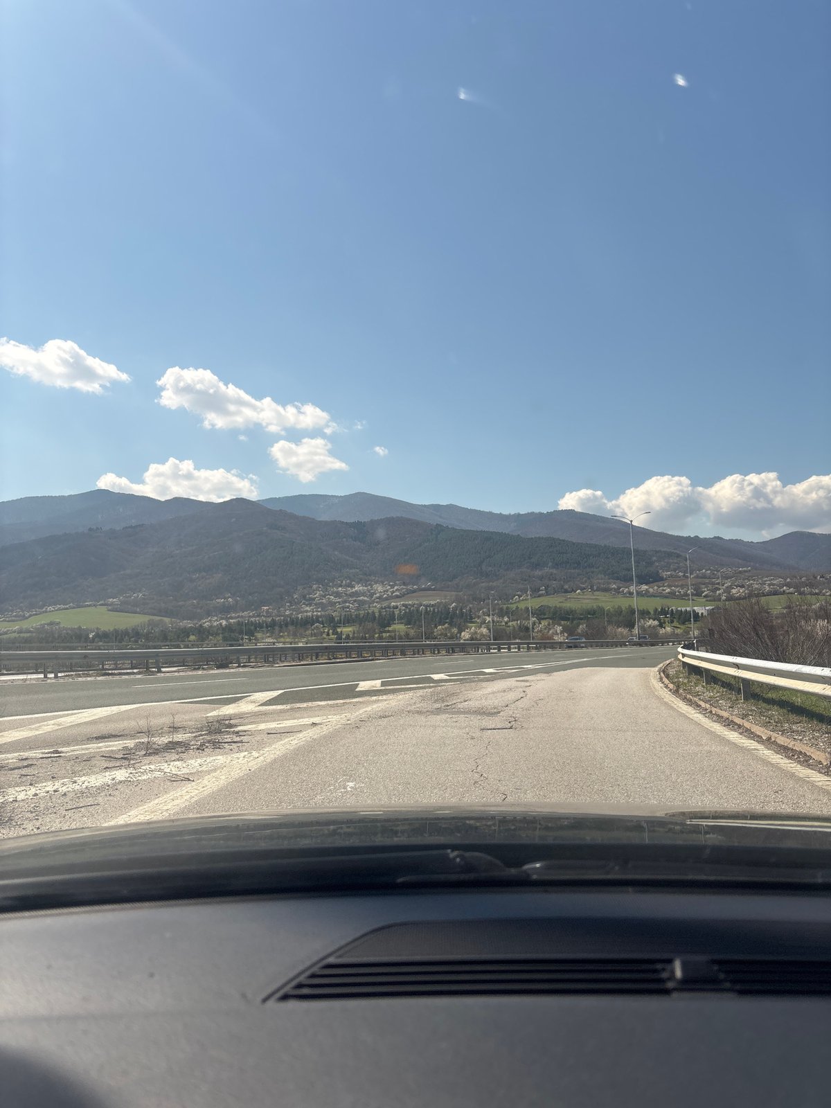Driver captures mountainous road view near Razliv, Bulgaria