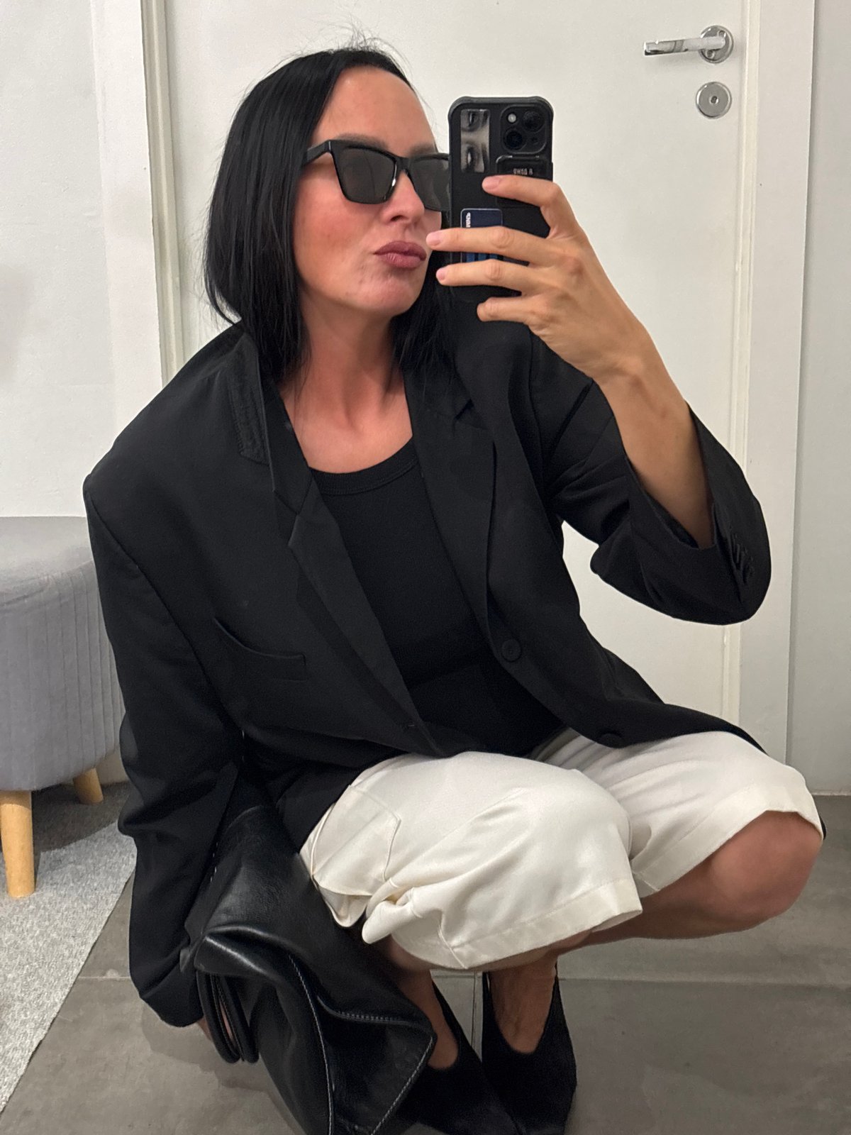 Woman documents outfit styling session across Chaikovsky locations