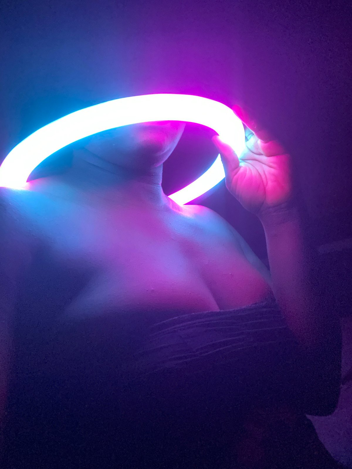 Person photographed with luminous ring light in Maigizo, Nigeria