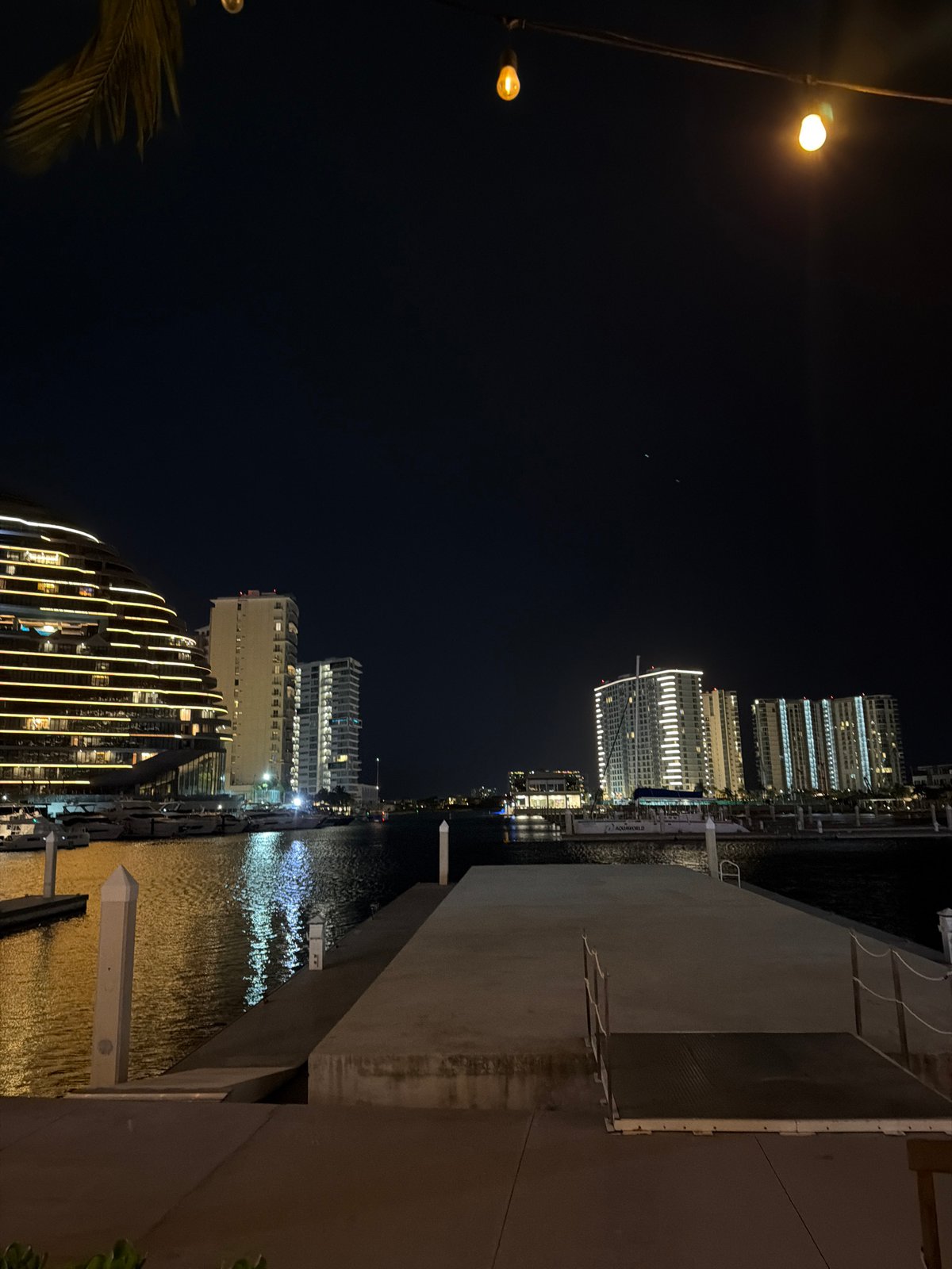 Nighttime waterfront scenes captured in Cancún, Mexico