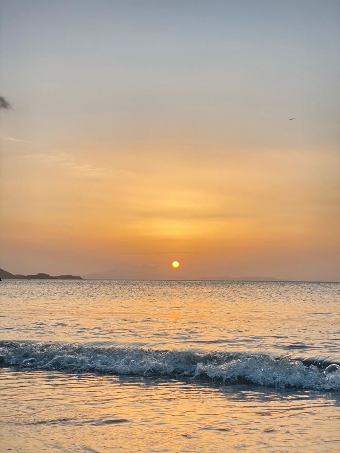 Evening sunset gathering documented in Juan Griego, Venezuela