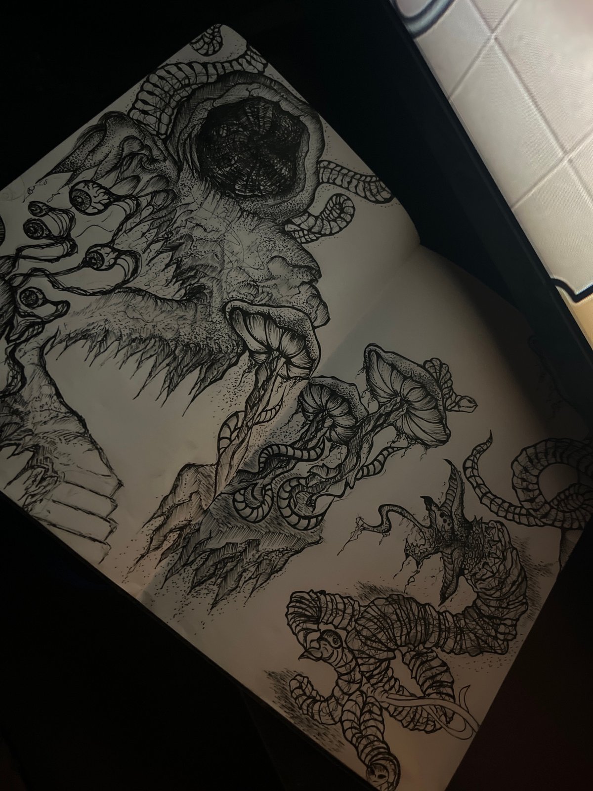 Artist documents detailed ink drawings in Sofia sketchbook session