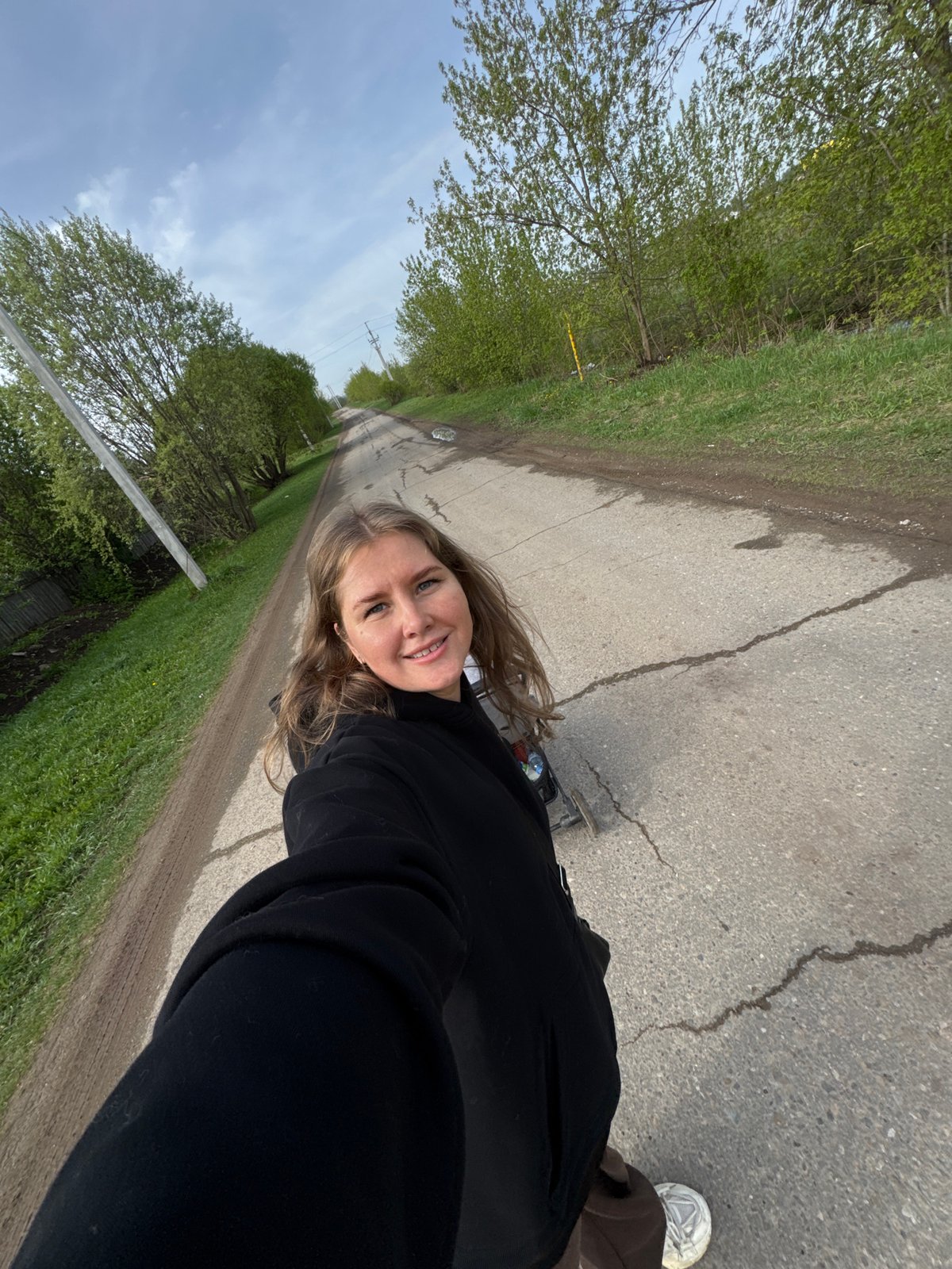 Woman and child photographed skateboarding in Горный, Russia