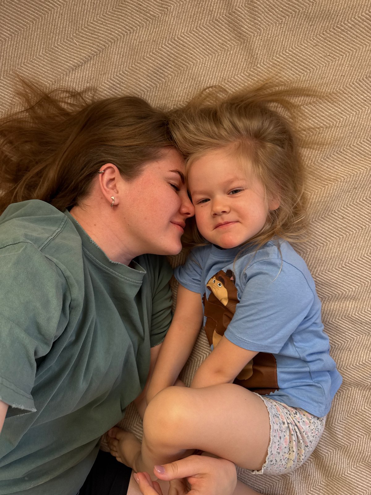 Mother and child share quiet morning moments in rural Russia
