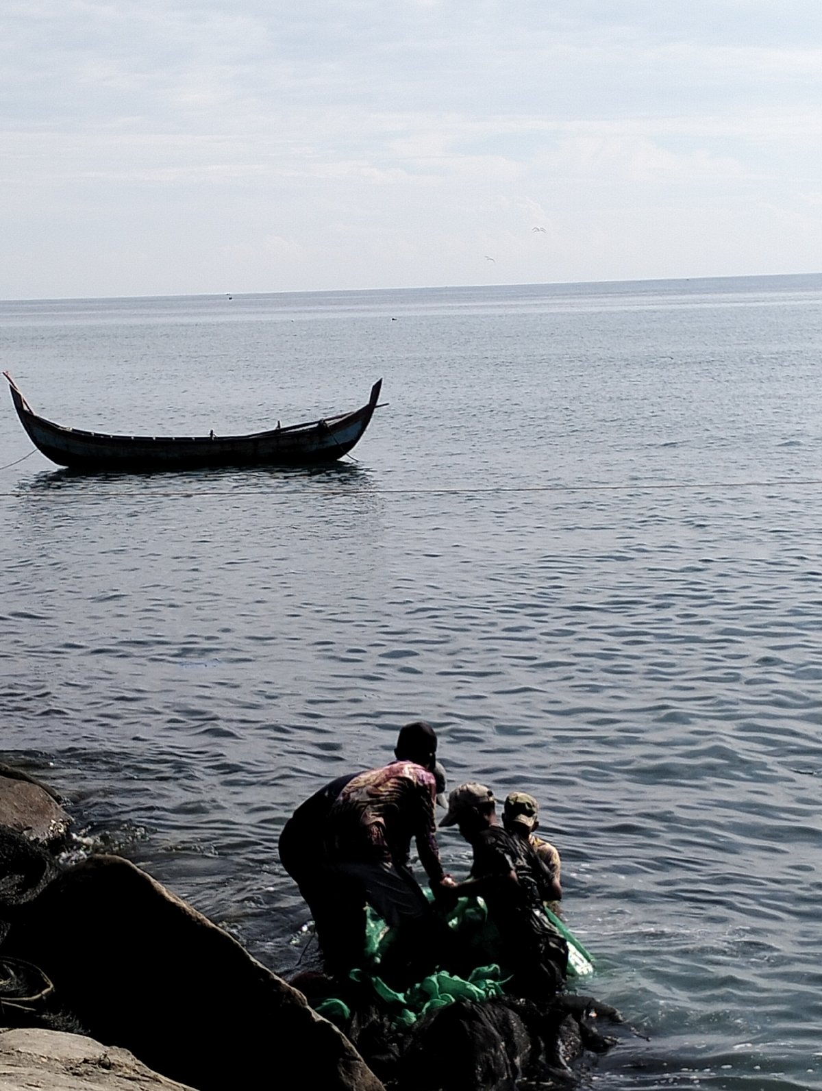Morning fishing operations documented along Lhokseumawe Indonesia coastline