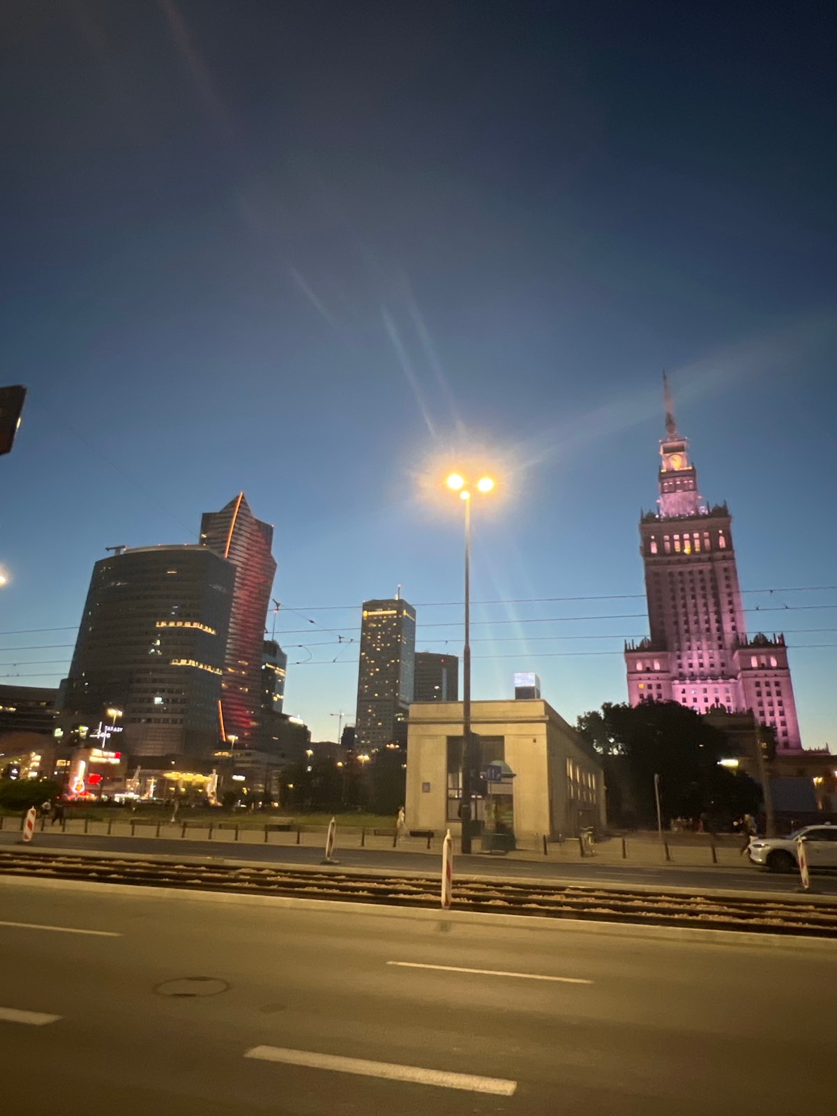 Warsaw city center at dusk, skyline and landmarks after sunset