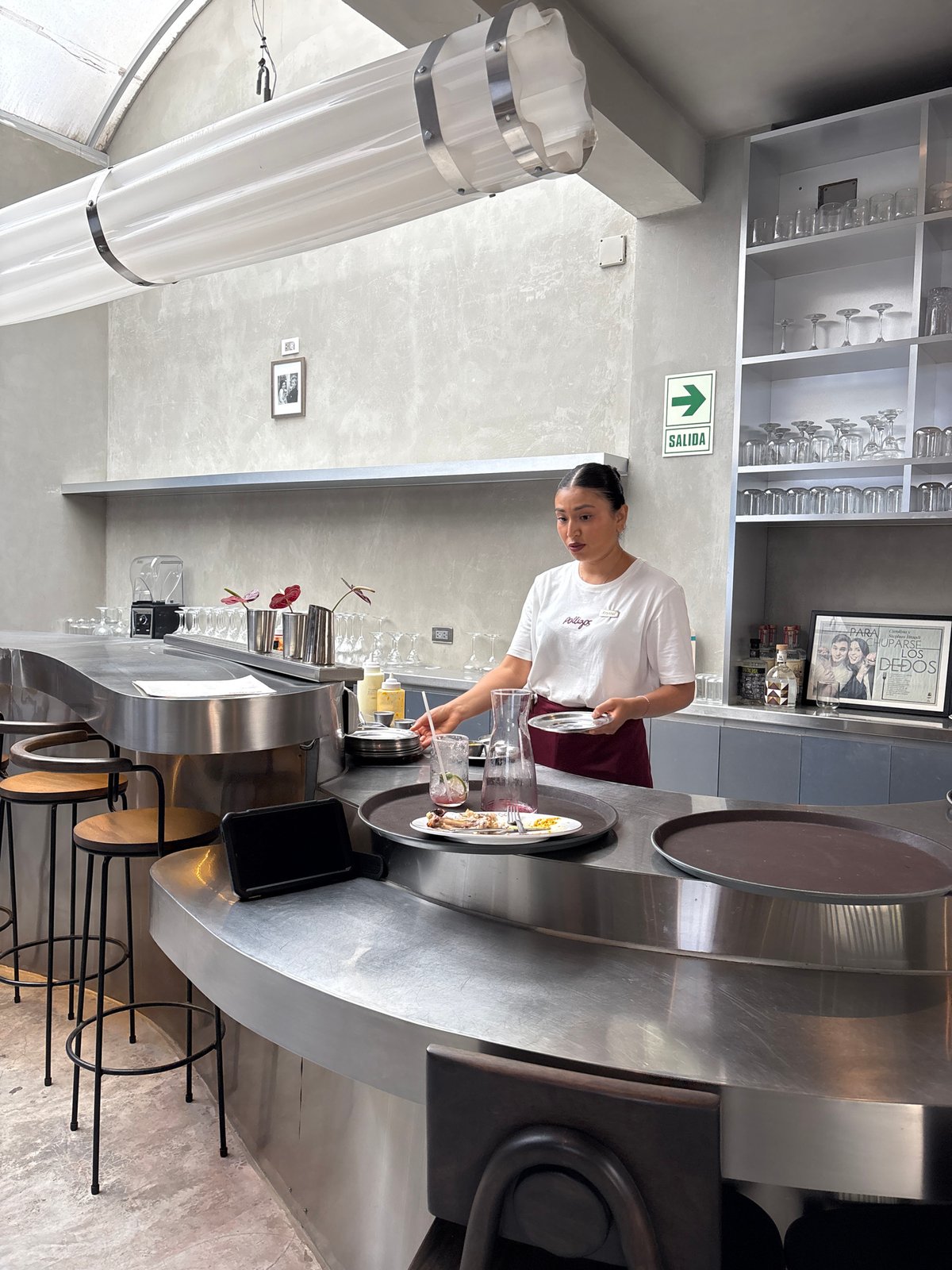 Restaurant service captured during dinner hour in Miraflores