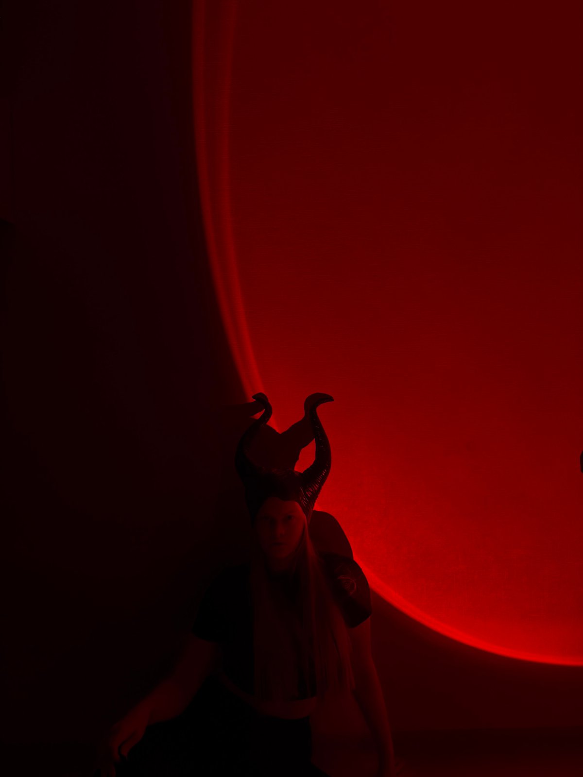 Dramatic red-tinted photo session documented in Izhevsk, Russia