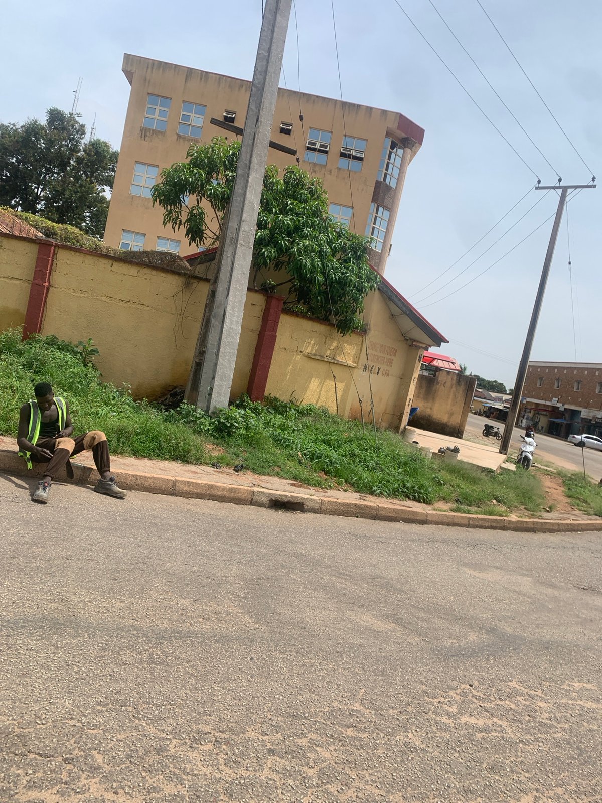 Inside and outside a Keke Napep on the streets of Jos