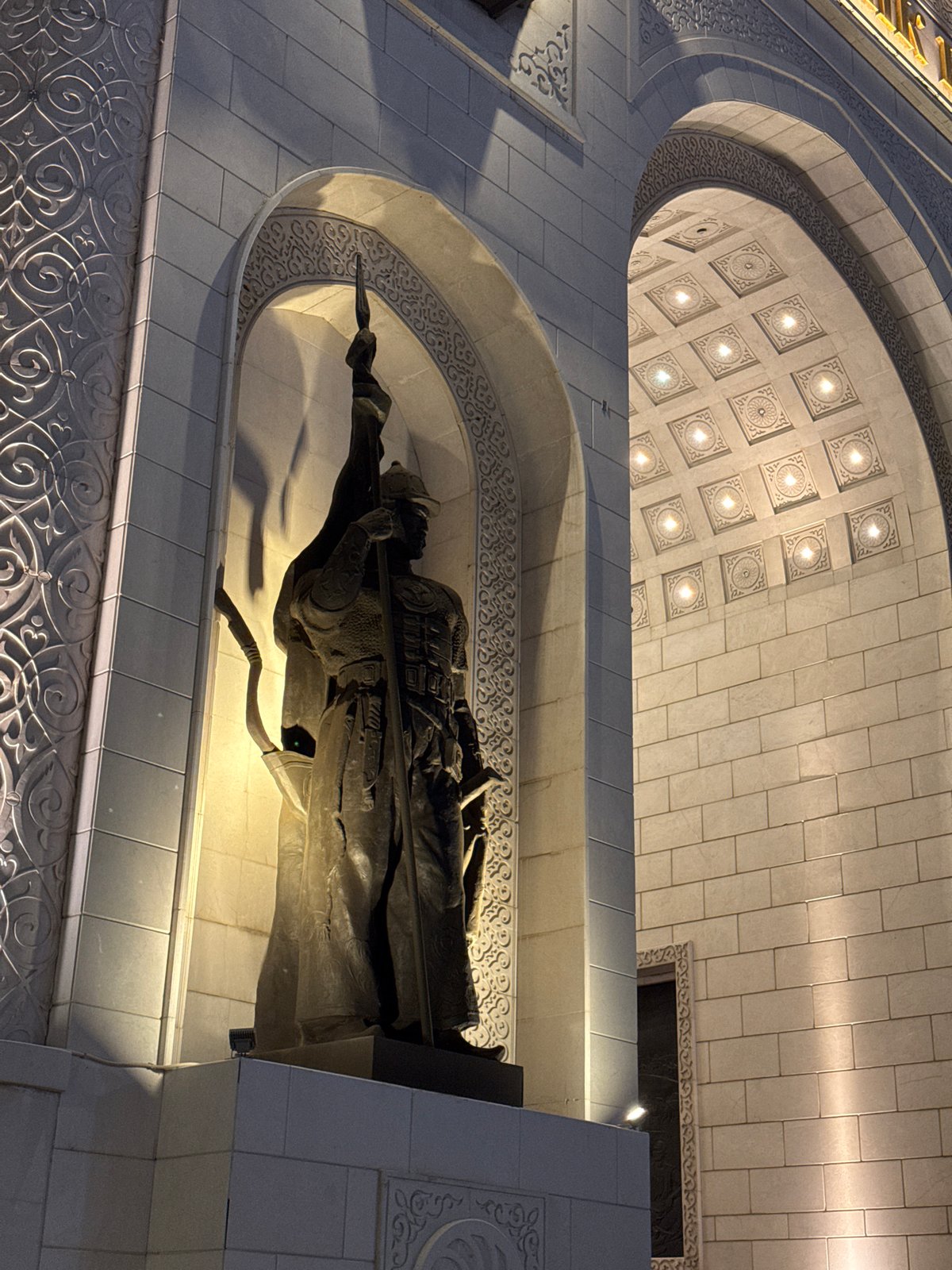 Evening stroll through illuminated Astana captured in 26 memories