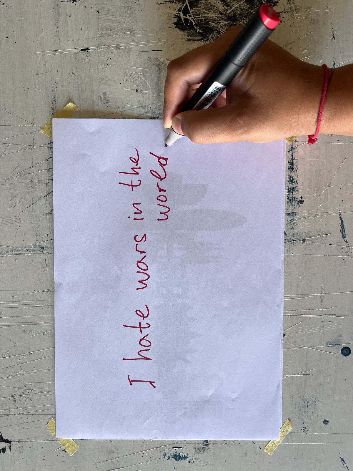 Handwritten anti-war message and orange #lck graphic from Mollet del Vallès