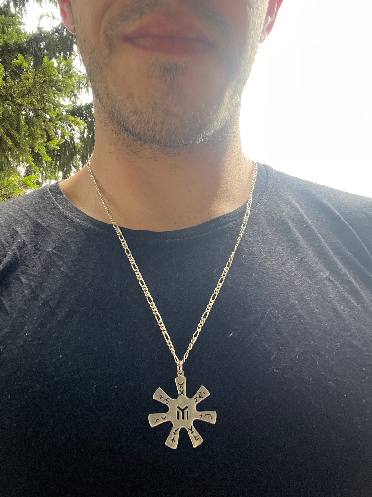 Star-shaped rune pendant on a silver chain, Sofia
