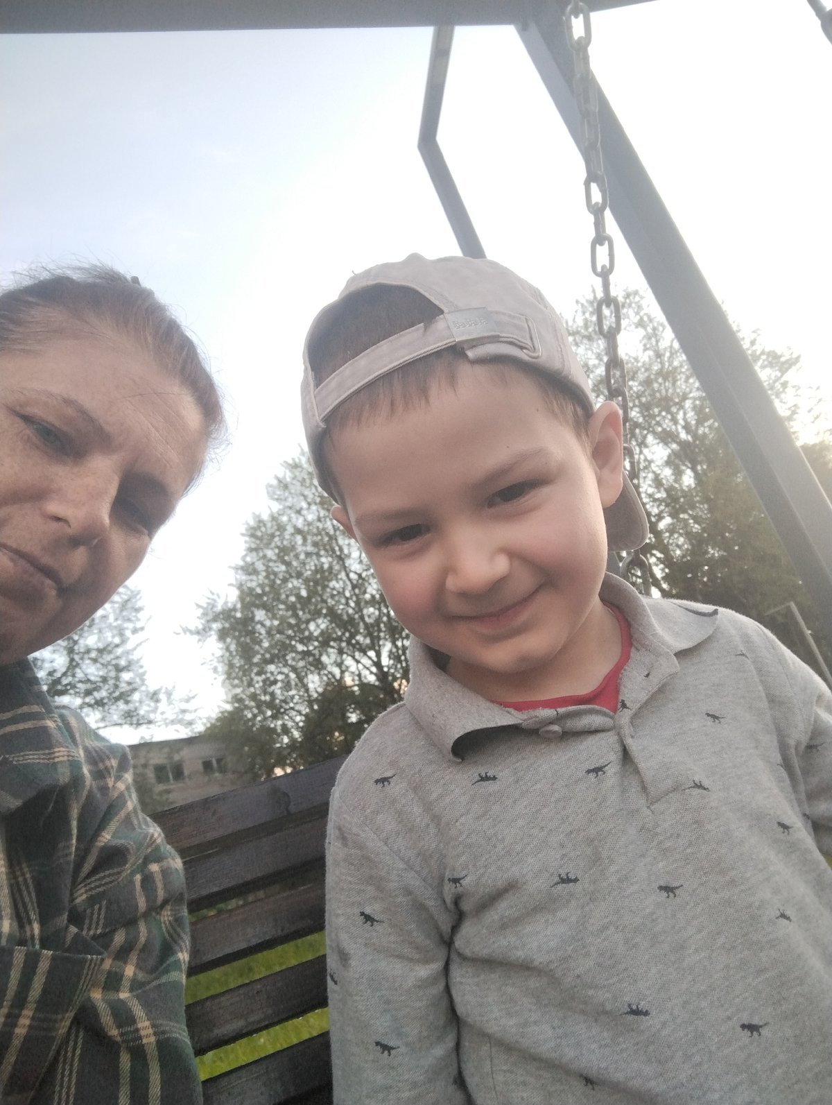 Afternoon at a Kingisepp park, swings and benches
