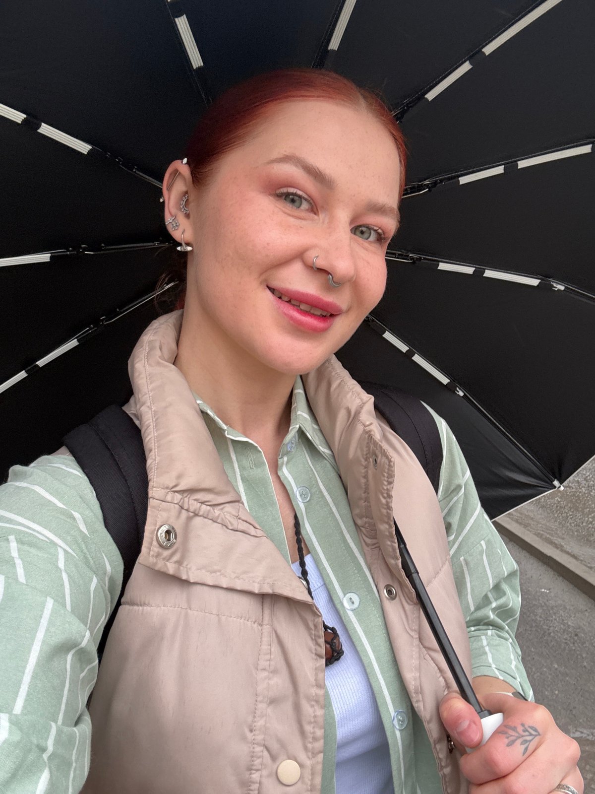 Spring flower vendors operate on wet Rostov-on-Don streets