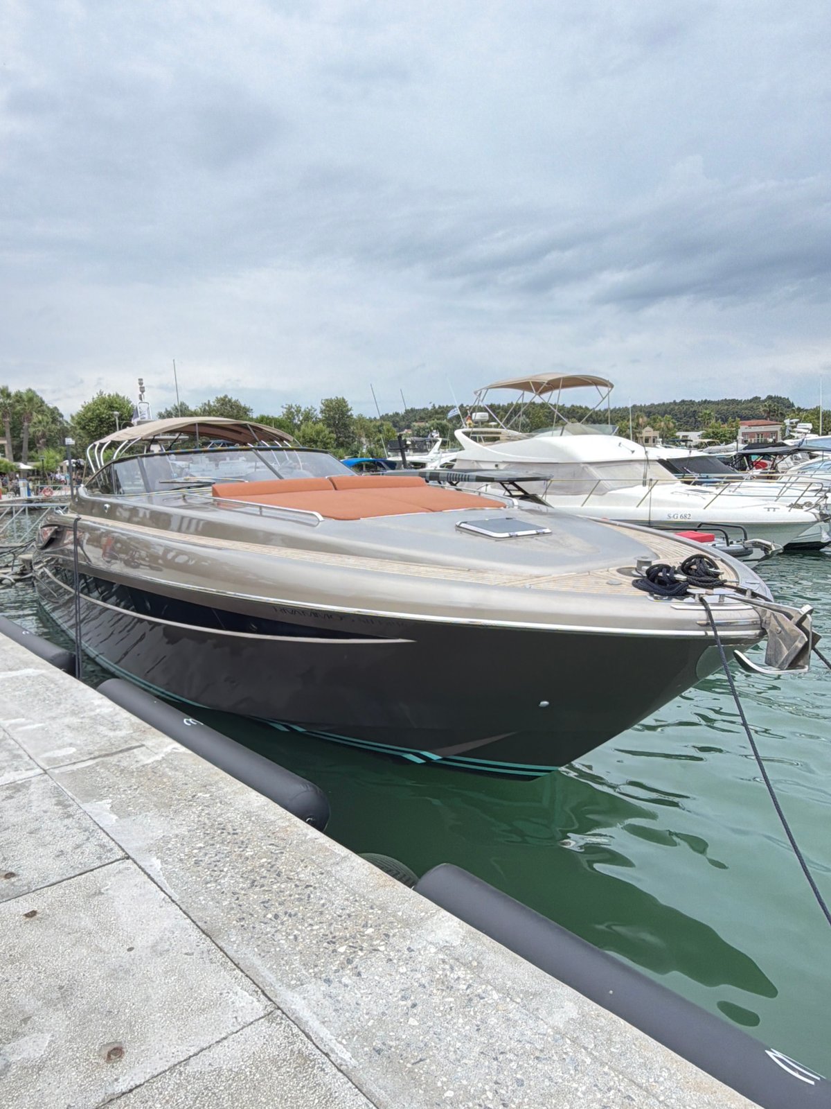 Luxury yachts moored at Kassandra marina on an overcast morning
