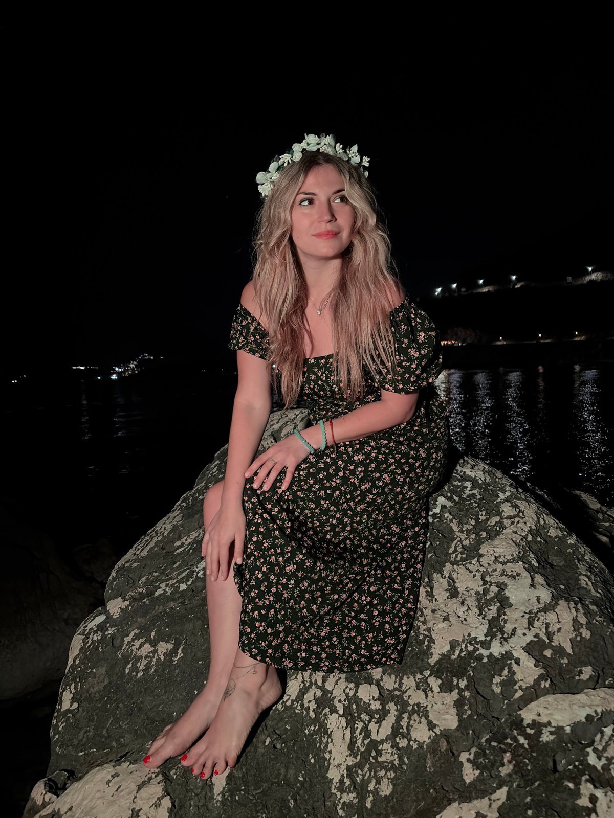 Woman in flower crown spotted on Montenegro coast at night