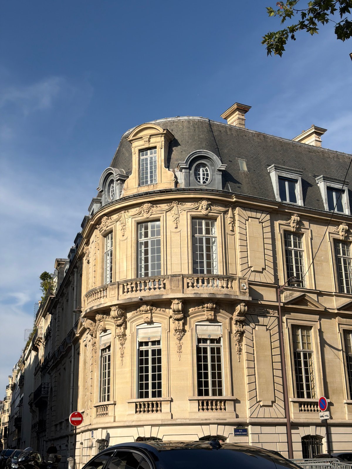 Paris landmarks and Haussmannian architecture on a sunny afternoon